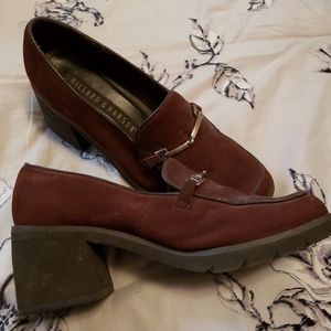 Brown suede shoes with square heel.